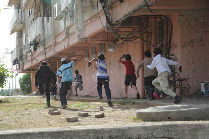 Israel and the Gaza Strip: Why Economic Sanctions Are Not Collective Punishment Israeli children running for a bomb shelter. (IDF Flickr)